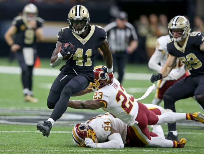 Nov 19, 2017; New Orleans Saints running back Alvin Kamara (41) runs from the Washington Redskins defense. Mandatory Credit: Chuck Cook-USA TODAY Sports